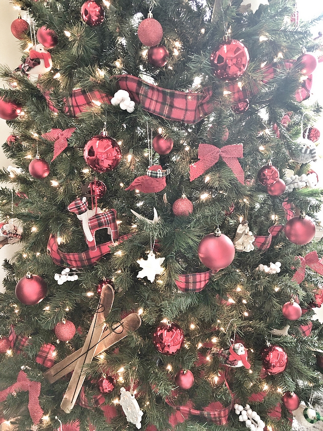 I add plaid ribbon weaved in and out of the tree because it adds so much to the tree #Christmas #plaid #Christmastree