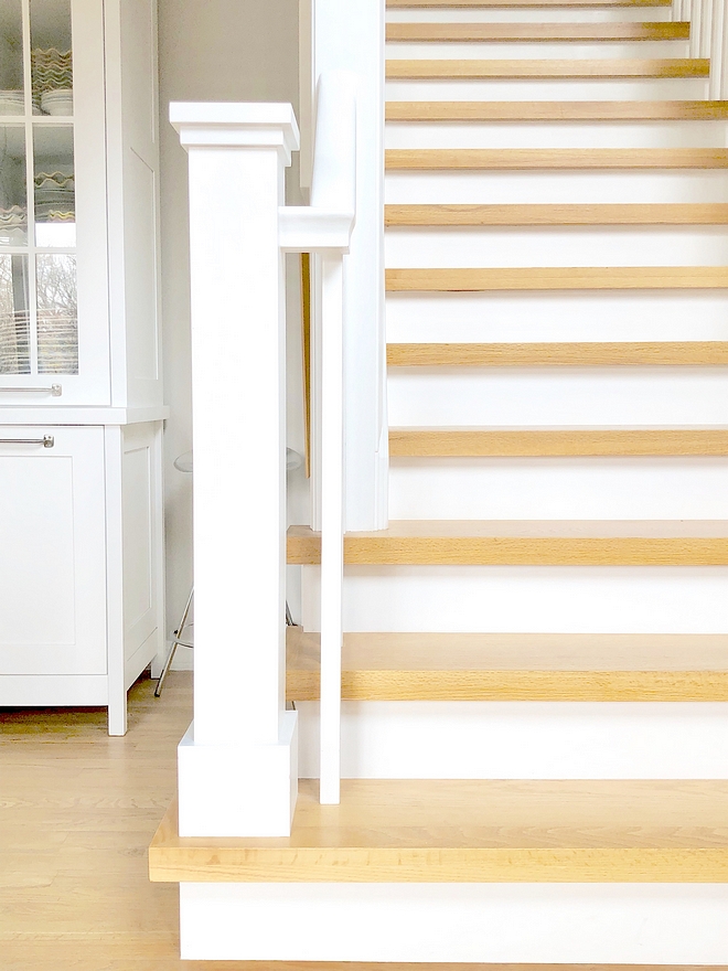 Stair Renovation We removed the carpeted treads and my husband suggested installing a thicker stair tread to give it a more modern look. We also replaced the turned newels and spindle balusters with a simple craftsman box newels and square baluster style #Stairrenovation #stair #renovation