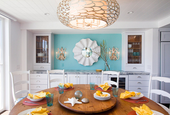 Coastal Dining Room This coastal dining room features an inspiring buffet-style cabinet #coastaldiningroom #coastalinteriors #coastalhomes #diningroom