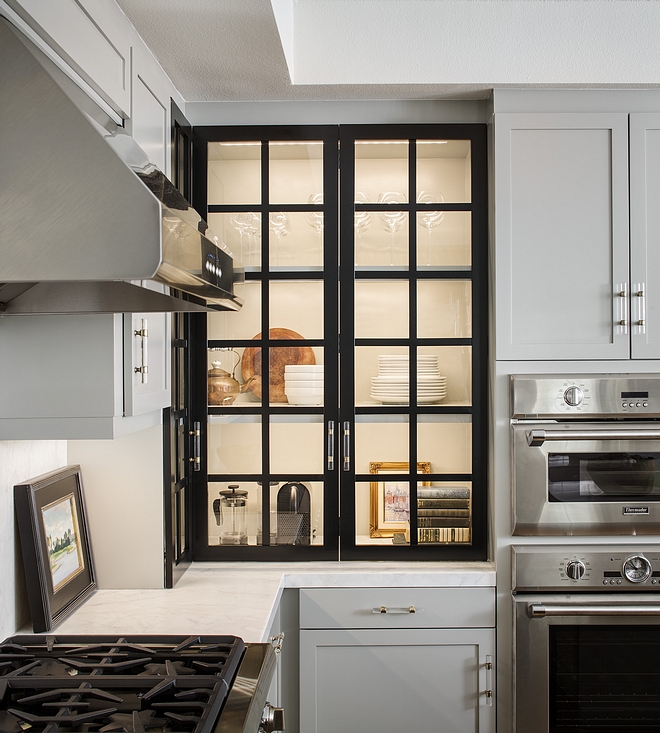 Black glass grid cabinet door The kitchen features a striking grid glass cabinet. This is an easy way to give a lot of personality to a kitchen without breaking the bank Black glass grid cabinet door Black glass grid cabinet door #Blackglasscabinetdoor #gridcabinetdoor