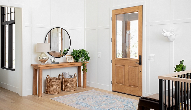 Grid Board and Batten Paneling The front door opens to a foyer with grid board and batten paneling and White Oak hardwood flooring Grid Board and Batten Paneling #GridBoardandBattenPaneling #GridBoardandBatten #BoardandBatten #Paneling