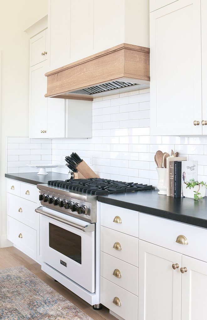 White kitchen cabinet with White Oak Hood White oak hood mantel with a clear protective finish #Whitekitchen #kitchencabinet #WhiteOakHoodmantel #WhiteOakhood #hoodmantel