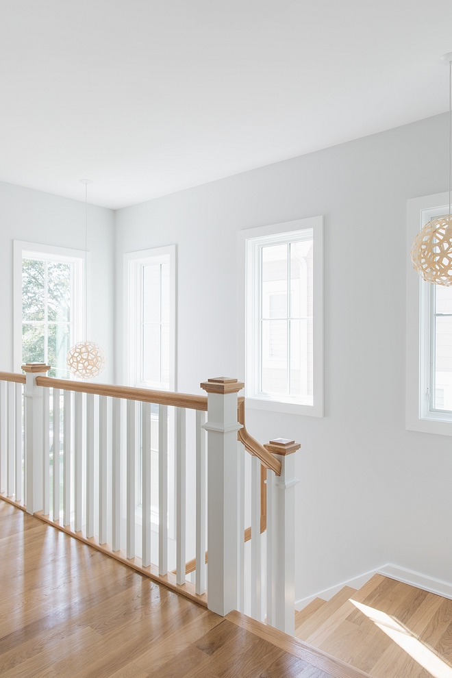 Sherwin Williams Extra White Window trim Staircase spindles Sherwin Williams Extra White Trim Paint color #SherwinWilliamsExtraWhite 