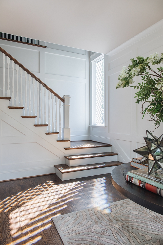 Foyer wainscotting oyer features floor-to-ceiling millwork on the first floor of the foyer This continues up the staircase and stops about 3’ up on the second floor as it creates a wainscoting chair rail height on the second floor Foyer wainscotting #Foyerwainscotting #Foyer #wainscotting