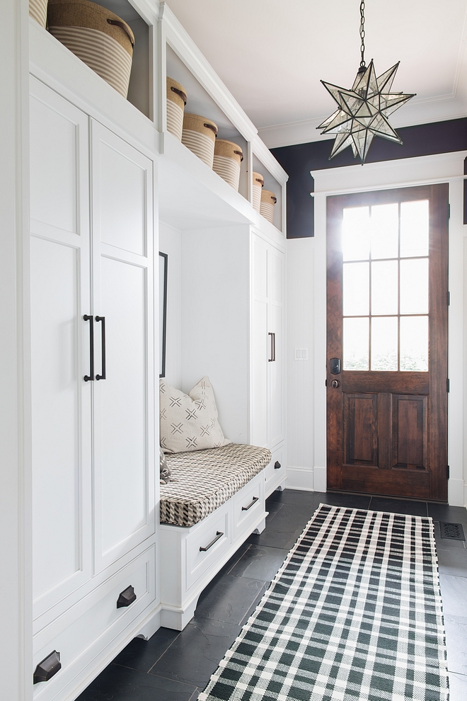 Mudroom Built-ins hides all the kids every day things while a huge walk in closet off that same area hides everything else. I don’t think anyone could have too big of a closet in their mudroom #mudroom #builtins #mudroombuiltin