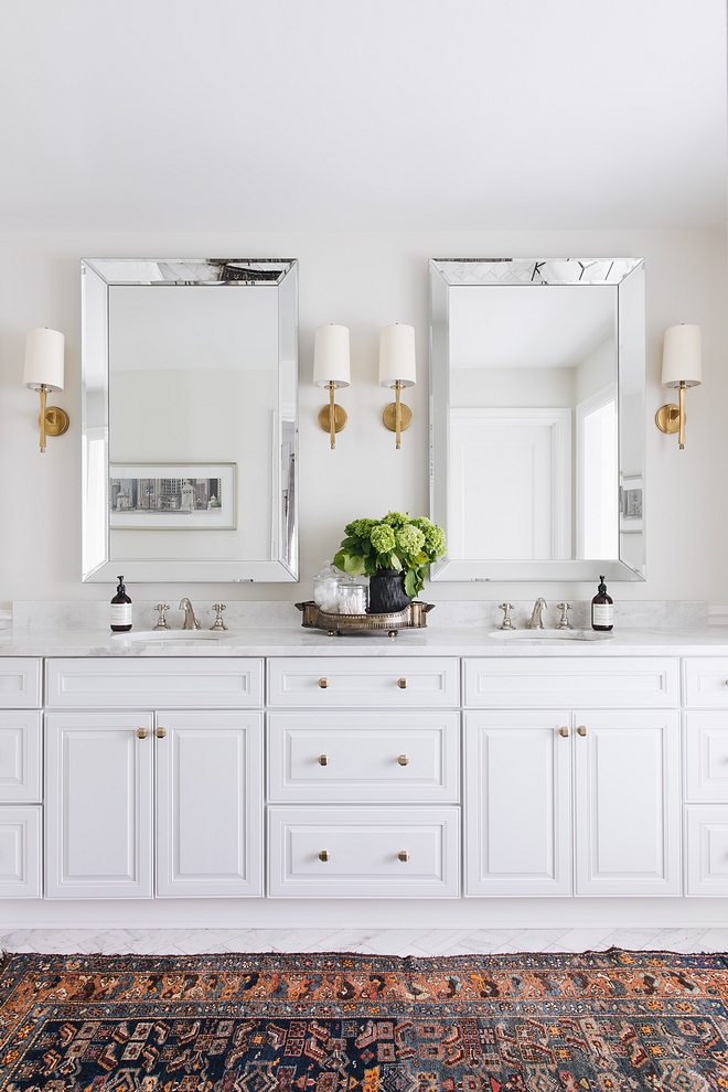 Bathroom Cabinets are painted in Benjamin Moore Decorator's White White Bathroom Cabinet Paint Color #BathroomCabinet #whiteBathroomCabinet #Decoratorswhitebenjaminmoore