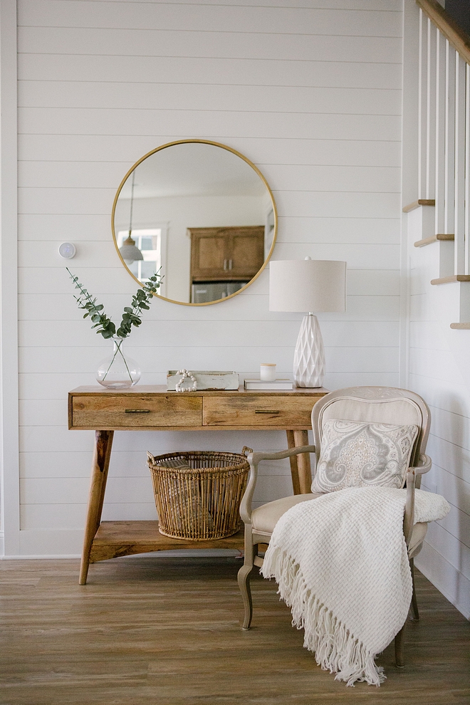 Foyer decor inspiration The foyer also features shiplap walls and a Mid-century inspired console table Foyer decor inspiration Foyer decor inspiration #Foyer #foyerdecorinspiration