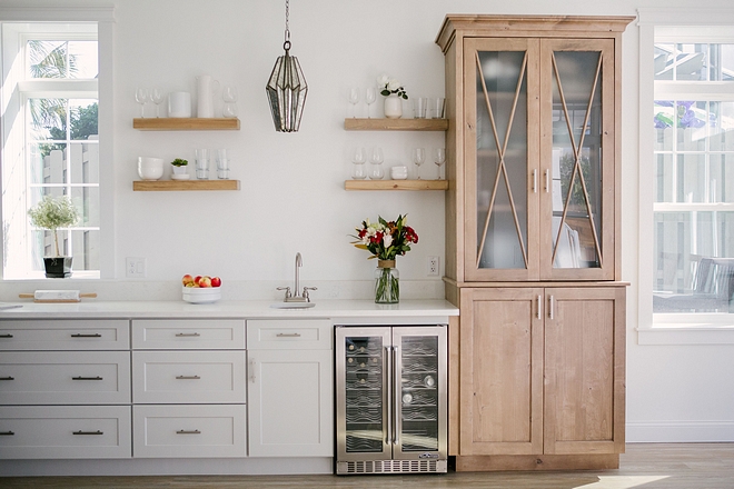 Kitchen Bar Cabinet This kitchen features a custom bar with open shelves and hutch #kitchen #bar #kitchenbar #klitchencabinet #openshelves #kitchenhutch #hutch