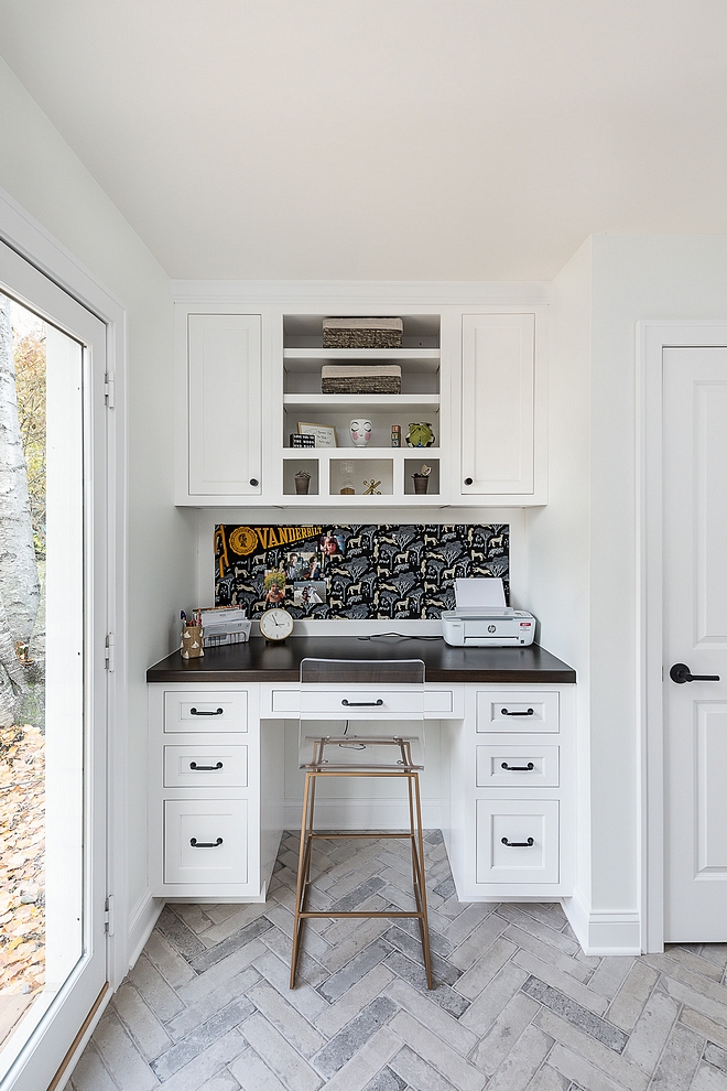 Custom Desk By elevating the desk you create enough height for a file cabinet on each side Countertop is stained wood #customdesk #builtindesk #desk #cabinetfile