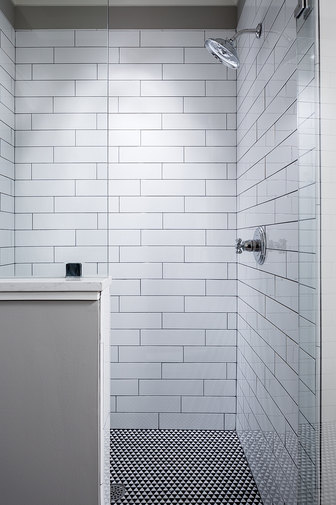 Shower Wall is 4x16 White Matte subway with standard gray grout #shower #tile #grout