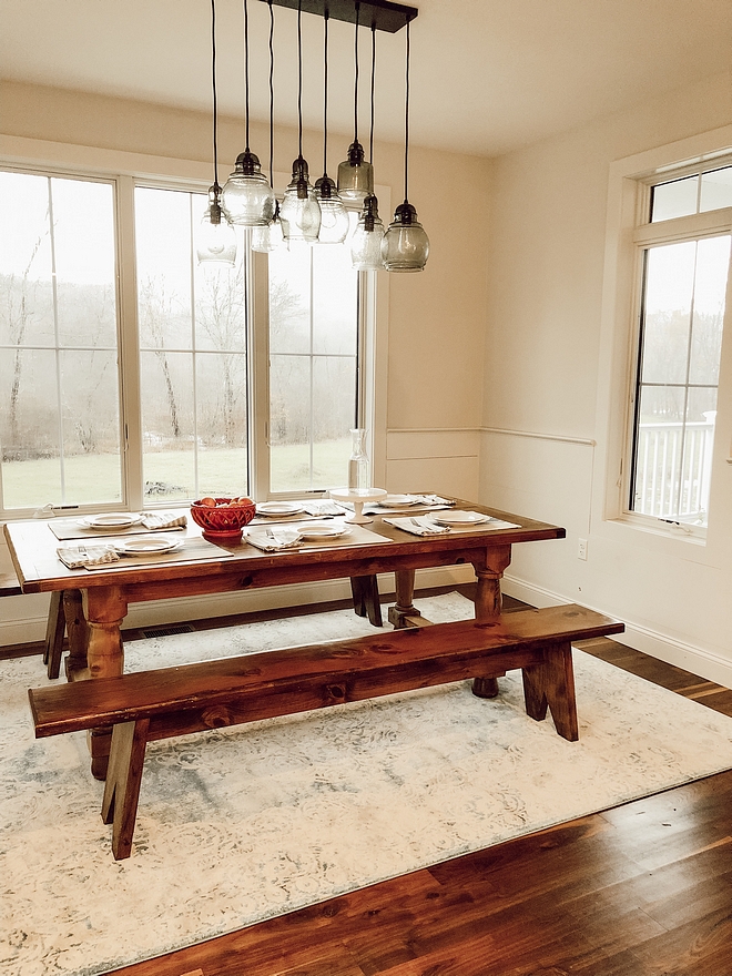 The dining nook has shiplap chair rail Wall color is Benjamin Moore Classic Gray #shiplapchairrail #BenjaminMooreClassicGray