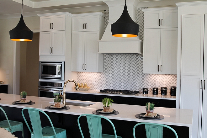 Kitchen with white upper cabinets and black lower cabinets and black island Kitchen with white upper cabinets and black lower cabinets and black island Kitchen with white upper cabinets and black lower cabinets and black island #Kitchen #kitchenwhiteuppercabinets #kitchencabinet #blacklowercabinets #blackisland