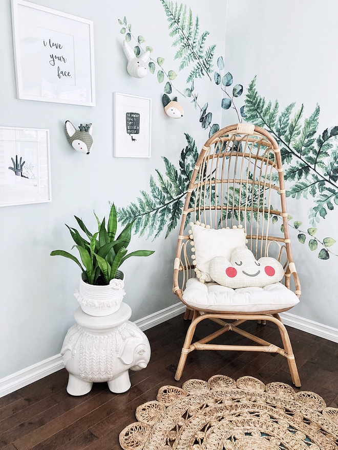 Kids Reading Nook These fern decals make this reading nook a lot of fun for my four-year-old. And while I would have loved a hanging chair, I didn’t think it was practical for my boys so I opted for this caged freestanding chair instead #kidsreadingnook #readingnook #diy
