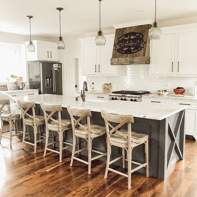 Farmhouse kitchen with white perimeter cabinets and a long farmhouse kitchen island #farmhousekitchen #farmhousekitchenisland #farmhouseisland