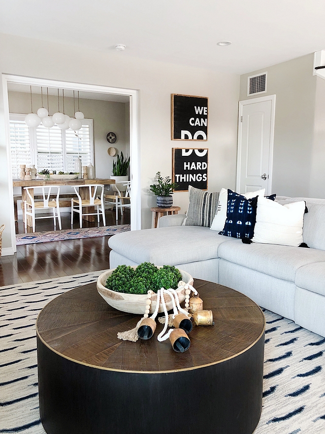 Rustic Round Coffee Table Black coffee table Its simple form is offset with dark brown oak strips, cut in a unique starburst pattern on top. Framed by a lightly distressed brass ring and ebony stained sides #coffeetable #roundcoffeetable #rusticcoffeetable