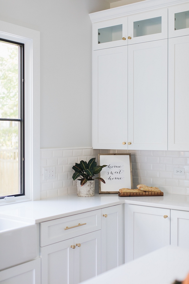 Kitchen with white cabinet white quartz countertop and 3x6 Bevel Square Edge Field White Glossy tile White kitchen Backplash #Kitchen #whitecabinet #whitequartz #countertop #3x6Beveltile #WhiteGlossy #beveltile