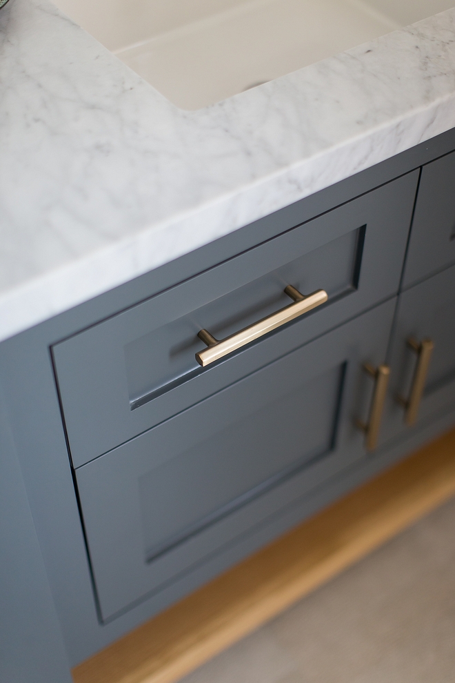 Grey cabinet with Satin Brass hardware