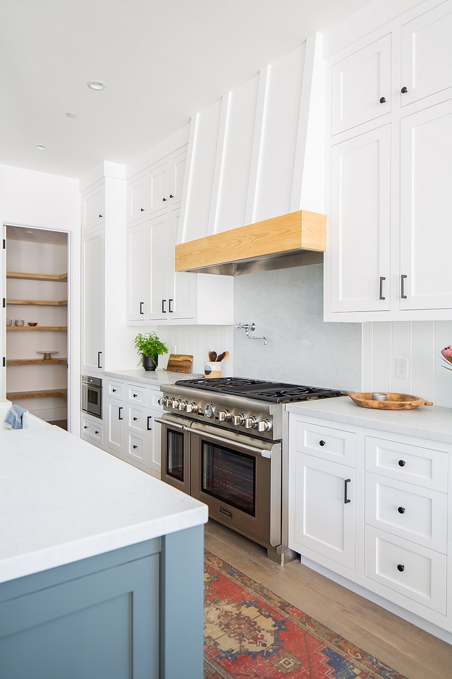 Kitchen Cabinetry Kitchen Cabinetry Kitchen Cabinetry Shaker Style, Face Framed Cabinetry Throughout Three Finishes; white painted around the perimeter and at range elevation, dark gray on island and white oak at buffet elevation and on hood detail #KitchenCabinetry #Kitchen #Cabinetry