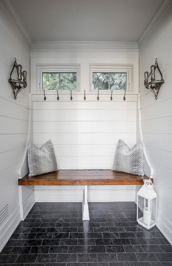 Small Mudroom Ideas Tucked into a nook, the mudroom bench features a custom chunky Knotty Pine bench and beautiful millwork Small mudroom Small mudroom #Smallmudroom #mudroom #bench #mudroombench