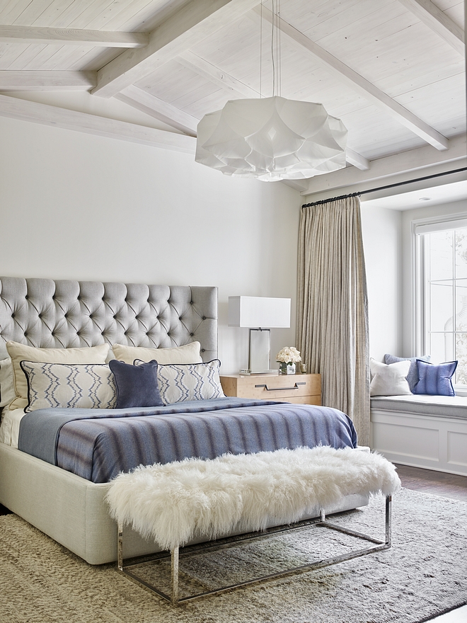 Bedroom Vaulted beamed ceiling The master bedroom features a stunning greywashed vaulted ceilings with shiplap and exposed beams and an inviting window-seat Bedroom Vaulted beamed ceiling #bedroom #Bedroomceiling #Vaultedbeamedceiling #shiplap #greywashbeam #beamedceiling #windowseat