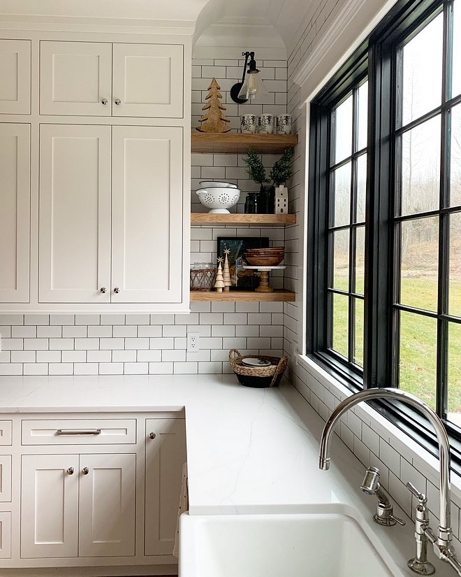 White kitchen with black windows subway tile backsplash with black grout to work with black windows I decided to tile the whole wall to create a focal point #kitchenblackwindow #kitchenwindow #kitchensinkwindow #kitchen #window #blackwindow