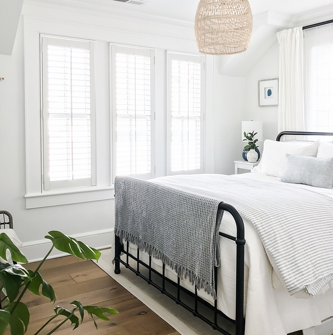 Black metal bed Black matte metal bed Featuring a black metal bed and comfortable white and grey linens, this bedroom exudes a timeless and inviting feel #Blackmetalbed #Blackmattemetalbed #metalbed #bedroom