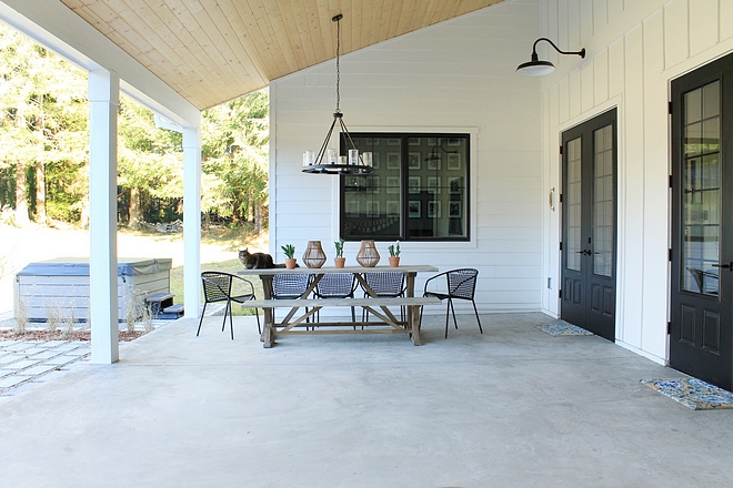 The living room French doors open to a very spacious back porch