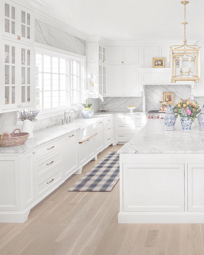 Kitchen Cabinet Details Inset custom painted maple traditional elegant shaker style cabinets painted in Benjamin Moore OC-117 Simply White to match the wainscoting Benjamin Moore OC-117 Simply White #BenjaminMooreOC117SimplyWhite #KitchenCabinet #KitchenCabinetDetails #Insetcabinet #insetKitchenCabinet #paintedmaplecabinet