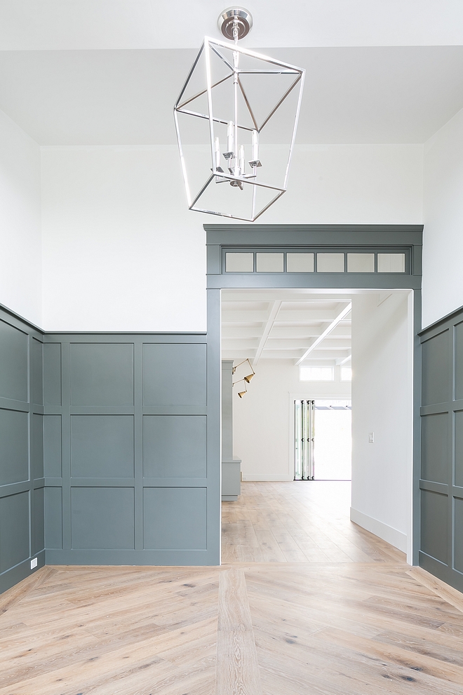 Grey grid board and batten paneling The front door opens to an impressive foyer with grey grid board and batten paneling Paint color is Sherwin Williams SW7068 Grizzle Gray #greygridboardandbatten #greyboardandbatten #greypaneling #SherwinWilliamsSW7068GrizzleGray