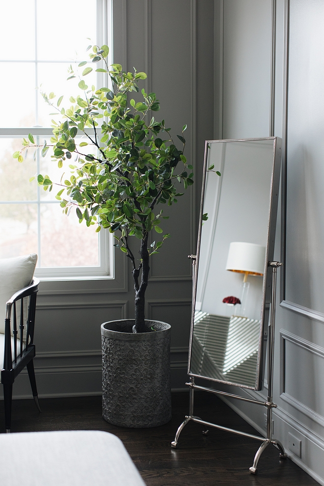 Vintage style stainless steel floor mirror A vintage-style floor mirror brings a classic and elegant feel to this grey bedroom #greybedroom #Vintagefloormirror #stainlesssteelfloormirror #floormirror