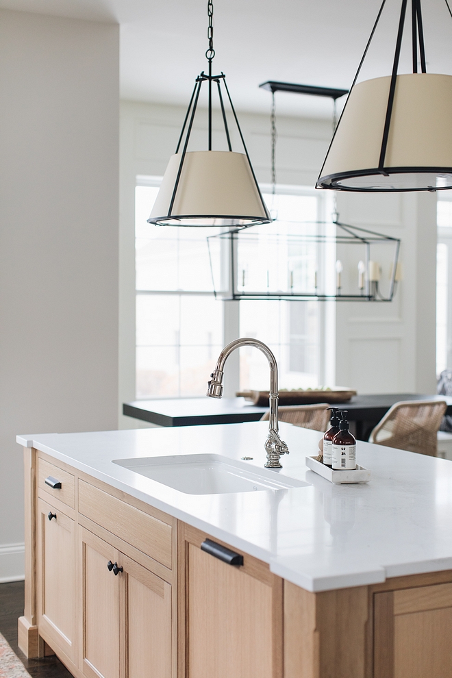 Caesarstone Calacatta Nuvo White quartz countertop on a Rift Oak Kitchen Island Caesarstone Calacatta Nuvo Countertop Rift Oak Kitchen Island Caesarstone Calacatta Nuvo Countertop #RiftOak #KitchenIsland #CaesarstoneCalacattaNuvo #Countertop #Quartz