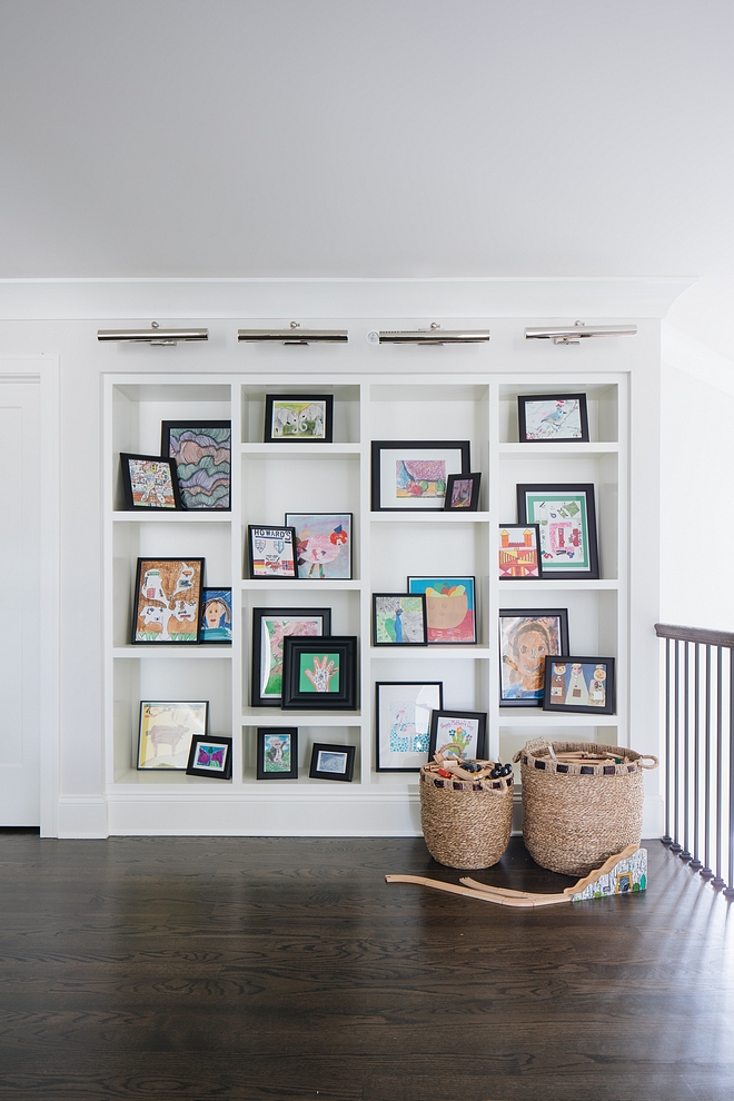 Asymmetrical bookcase This asymmetrical built-in bookcase is perfect to display the kids art, books and such Paint Color is Benjamin Moore Simply White Asymmetrical bookcase #Asymmetricalbookcase #bookcase