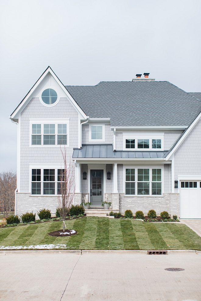 Grey shingle home exterior Siding is James Hardie Shakes in Pearl Gray.Trim: Hardie Arctic White #Siding #JamesHardie #JamesHardieShakes #JamesHardiePearlGray #HardiePearlGray