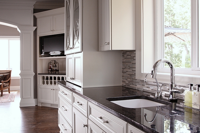 Wet Bar Kitchen Bar Cabinet This wet bar is functional and perfect for baking, notice that practical appliance garage under the glass doors #kitchenbar #wetbar #baking #appliancegarage