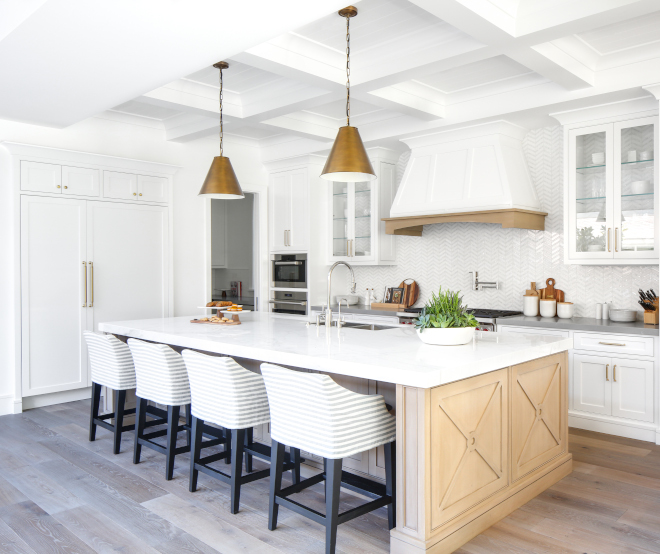 White Kitchen with Stacked Cabinets and Grey Island - Home Bunch