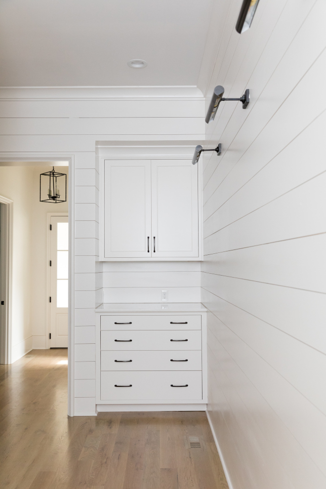 Mudroom Mudroom Drop Zone with shiplap A "drop zone" featuring a custom cabinet with drawers and upper cabinets complete this mudroom Paint color is Sherwin Williams Snowbound #Mudroom #DropZone #shiplap
