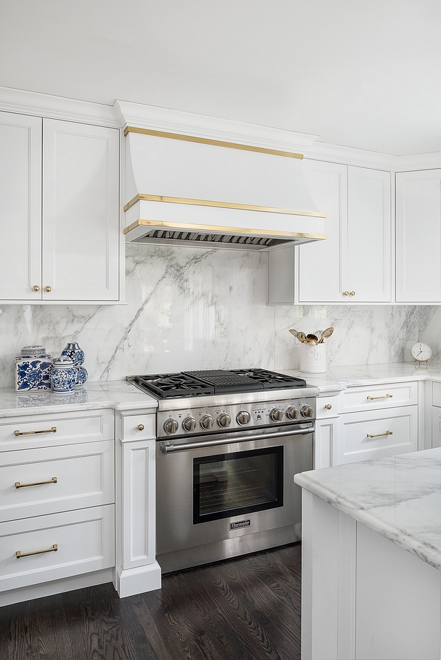 Brass Hood Brass Kitchen Hood The custom kitchen hood features brass straps, which beautifully coordinates with the brass hardware #Brasshood #brassstraps #Hood #kitchenhood