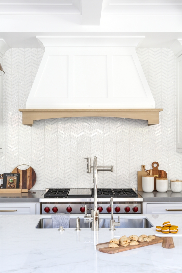 Kitchen Hood Top has three panels and it is painted in Dun Edwards DEW379 Igloo with tapered top Bottom is Rift White Oak #kitchenhood #hood #kitchen #taperedhood #Riftwhiteoak