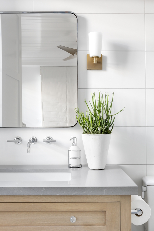 Bathroom shiplap tile and grey countertop Countertop is Grey Savoie Quartz, polished #bathroom #bathrooms #countertop #tile