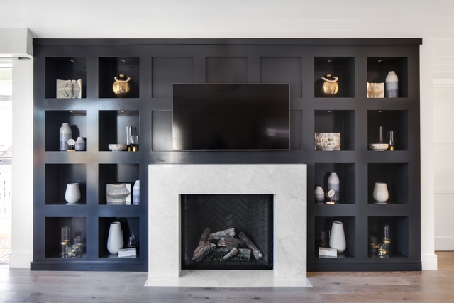 Jet Black Built-in Bookcase Jet Black Built-in Bookcase with white marble fireplace surround Jet Black Built-in Bookcase