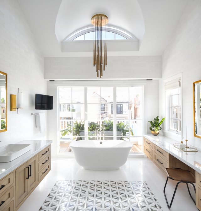 Bathroom windows This master bathroom is outstanding from every direction and don't worry about the windows... the large window we see ahead features motorized blinds #bathroom #windows #motorizedblinds #automaticshades
