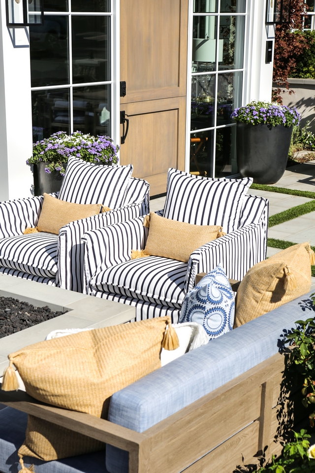 Comfortable outdoor furniture is more inviting and allows you to stay outside for a longer period of time Gorgeous striped upholstered outdoor chairs Comfortable outdoor furniture #outdoorfurniture