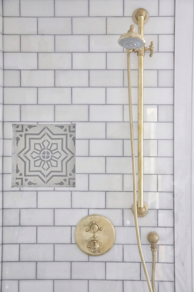 Shower Nook The homeowner added a shower nook for shampoo and soap using the same cement tile pattern #showernook