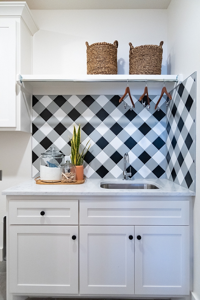 Plaid Tile Plaid Backsplash The laundry features 4x4 tiles (in white, grey and black tiles) in a buffalo check pattern. This is a fun and affordable way to add character to any space - it could even work on floors, just use larger tiles #plaidtile #PlaidBacksplash #buffalocheck #tile #tilepattern