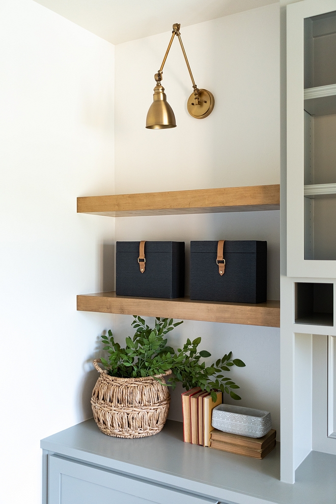 Brass Swing Arm Sconce over White Oak Floating Shelves Custom cabinet with Brass Swing Arm Sconce over White Oak Floating Shelves #BrassSwingArmSconce #SwingArmSconce