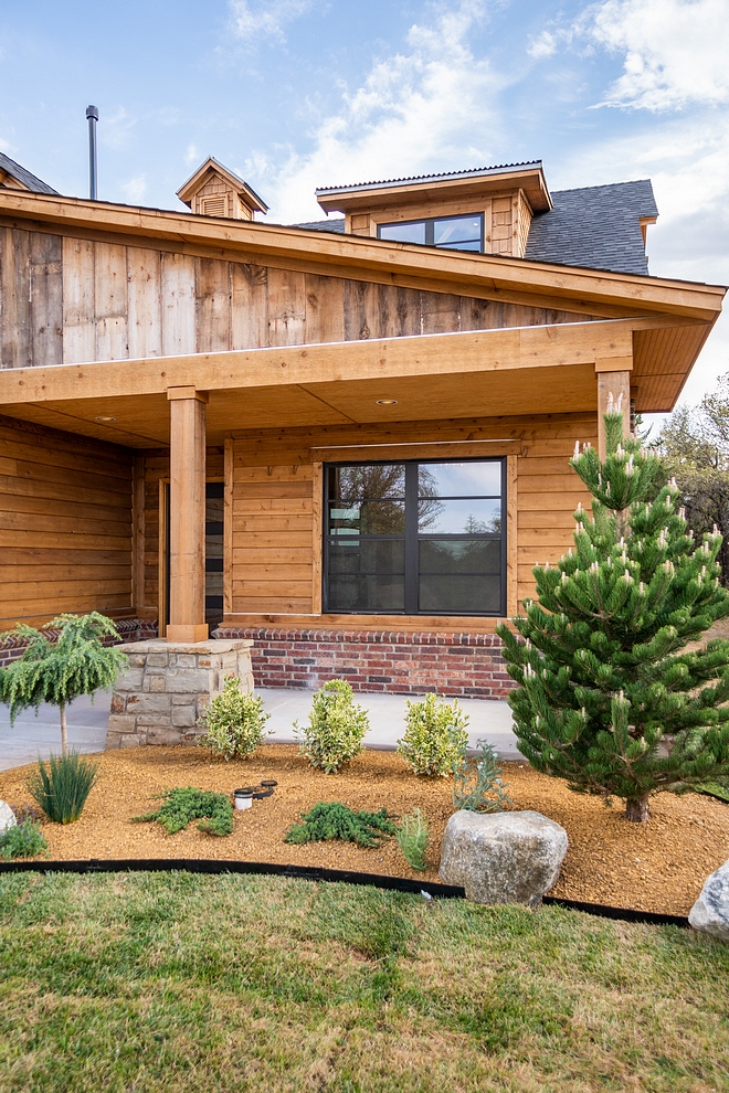 Real reclaimed barnwood accentuates the exterior of this home Rustic Homes Real reclaimed barnwood accentuates the exterior of this home #Realreclaimedbarnwood #exterior #rustichomes