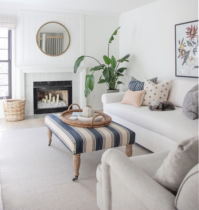 Striped Blue and white ottoman Neutral living room with Striped Blue and white ottoman and white walls and grey and blue accents Striped Blue and white ottoman #StripedBlueandwhite #StripedBlueandwhiteottoman #ottoman