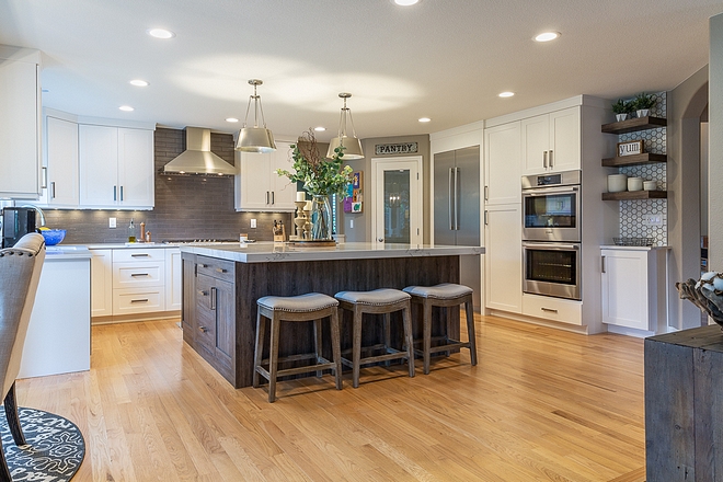 How to renovate a kitchen This client wanted to update their dated kitchen and give it a more modern feel. We started with a revised cabinet layout, first enlarging the island to allow for more seating and additional storage #howtorenovateakitchen #kitchen #renovate #reno #renovation