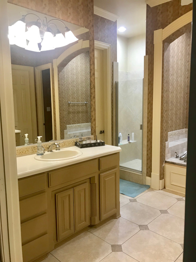 Master bath Before Cabinet Up close of the old vanity, floors and smaller shower See AFTER renovation pictures on Home Bunch