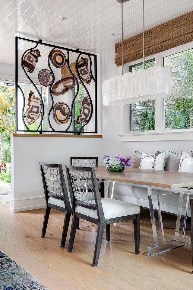 Dining Room Dining table is custom designed,  made of live edge wood slab and acrylic legs that compliment the Selenite chandelier #diningroom #diningtable #smallspaces #beachhouse #lucite #acrylicfurniture #acryliclegs